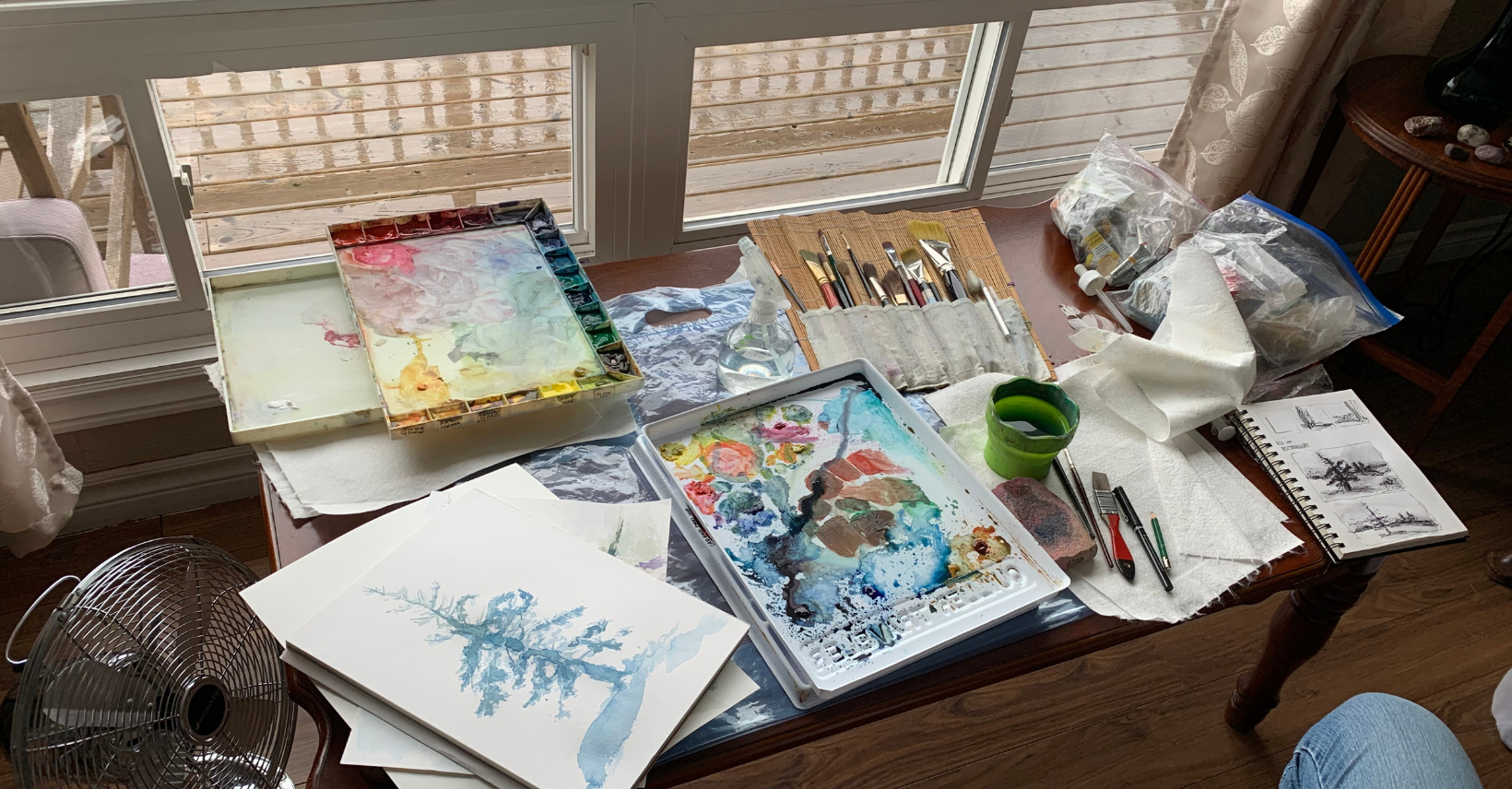 Open sketchbook on a studio table at Big Blue
